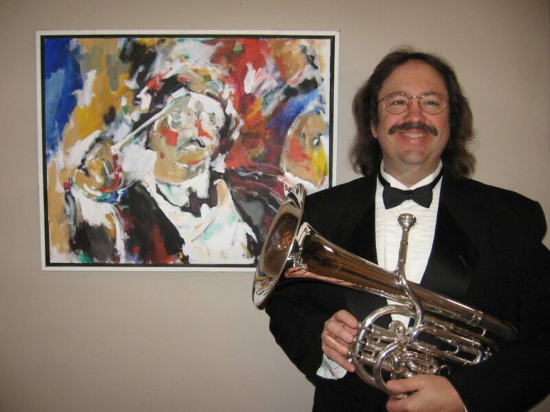 Charles Preis with a painting titled, Charles Pries by Guy Williams.