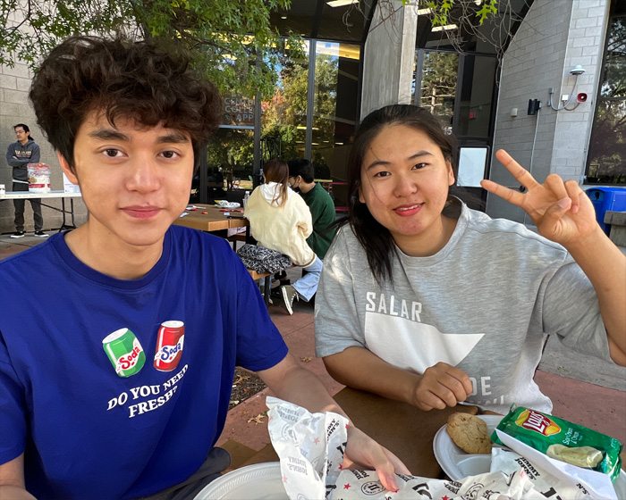 Two students attended an outdoor AANAPISI event.