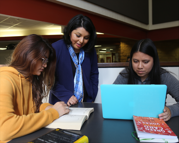 Our Multicultural Center Director is meeting with two students in The Nest, West Campus.