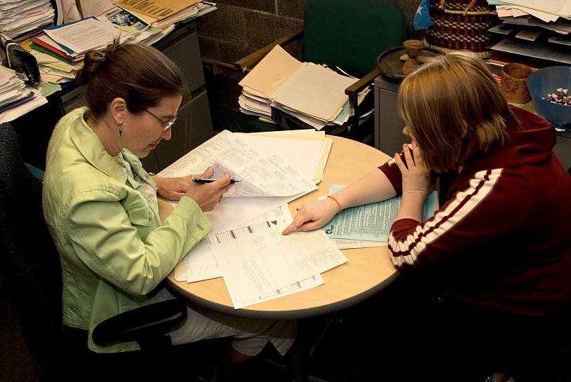 Counselor working with a student.