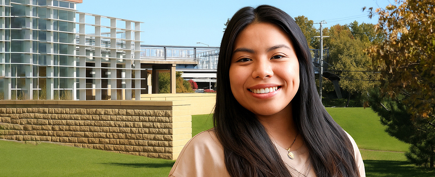 Female student in front of the Century College East Campus Library.