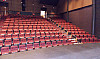 A view of the Century College theatre stage from the audience.
