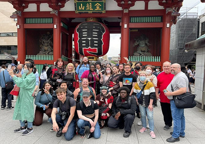 SPR23 Study Abroad student's group photo in front of a temple.