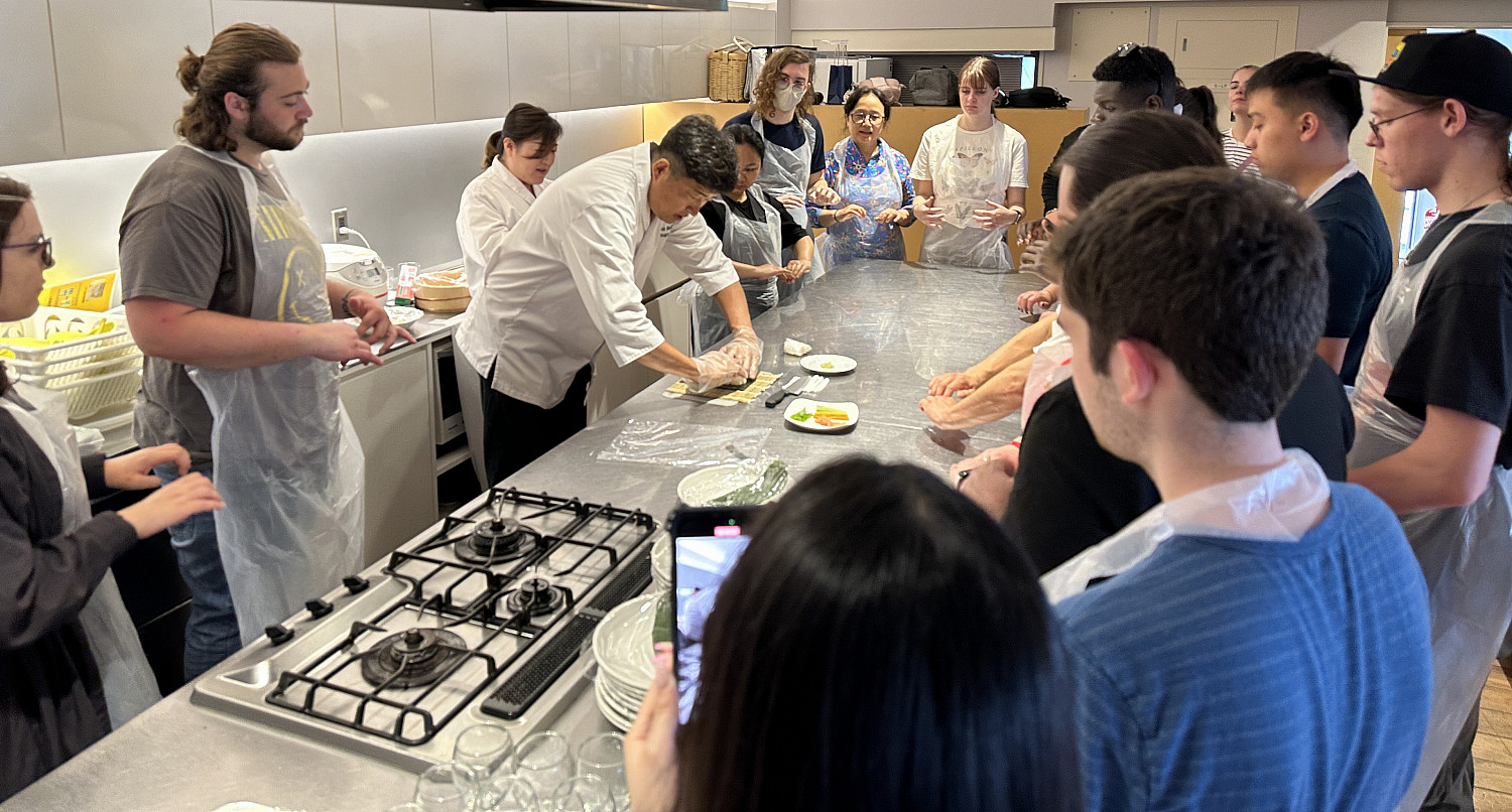 SPR24 Study abroad students taking a sushi making class.