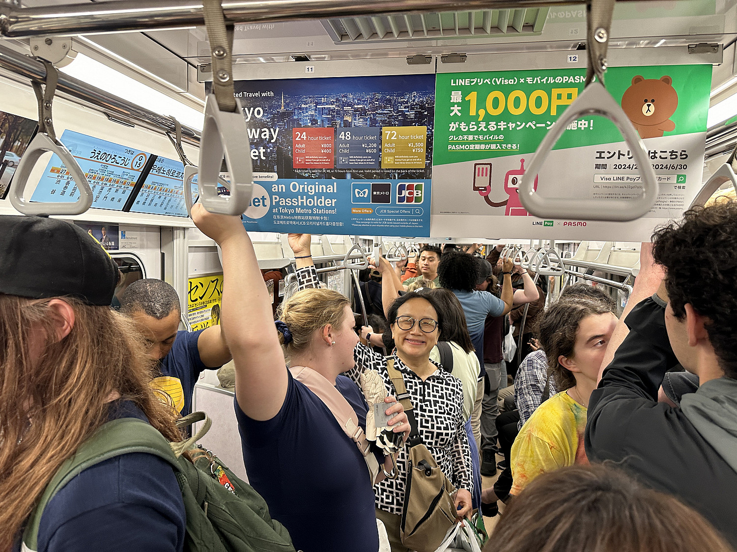 SPR24 Study abroad students navigating the Tokyo metro station.