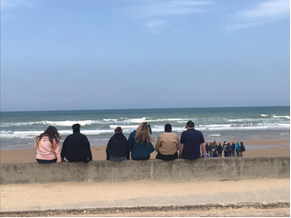 A group photo in Normandy during the 2023 Study Abroad trip to France.